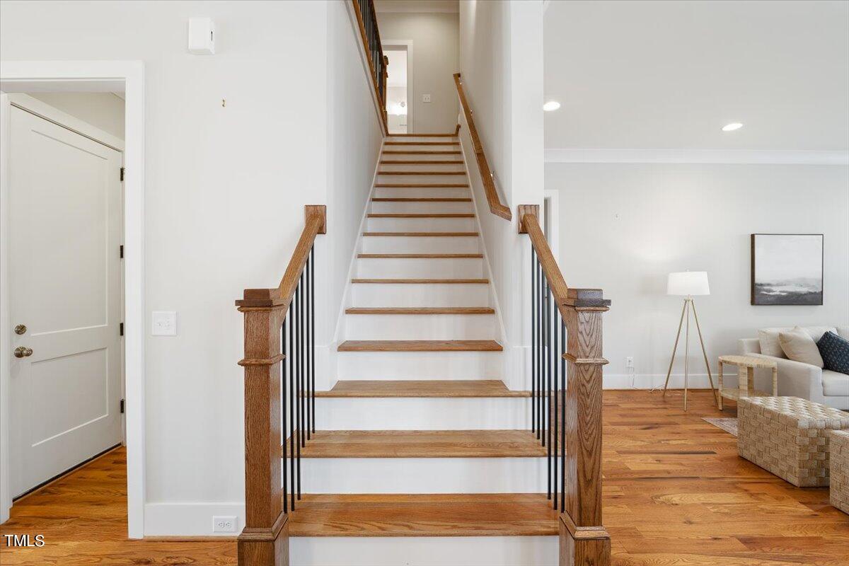 6152 Blanche Drive Raleigh, NC 27607 - Photo 33 of 47 a view of entryway and hall with wooden floor