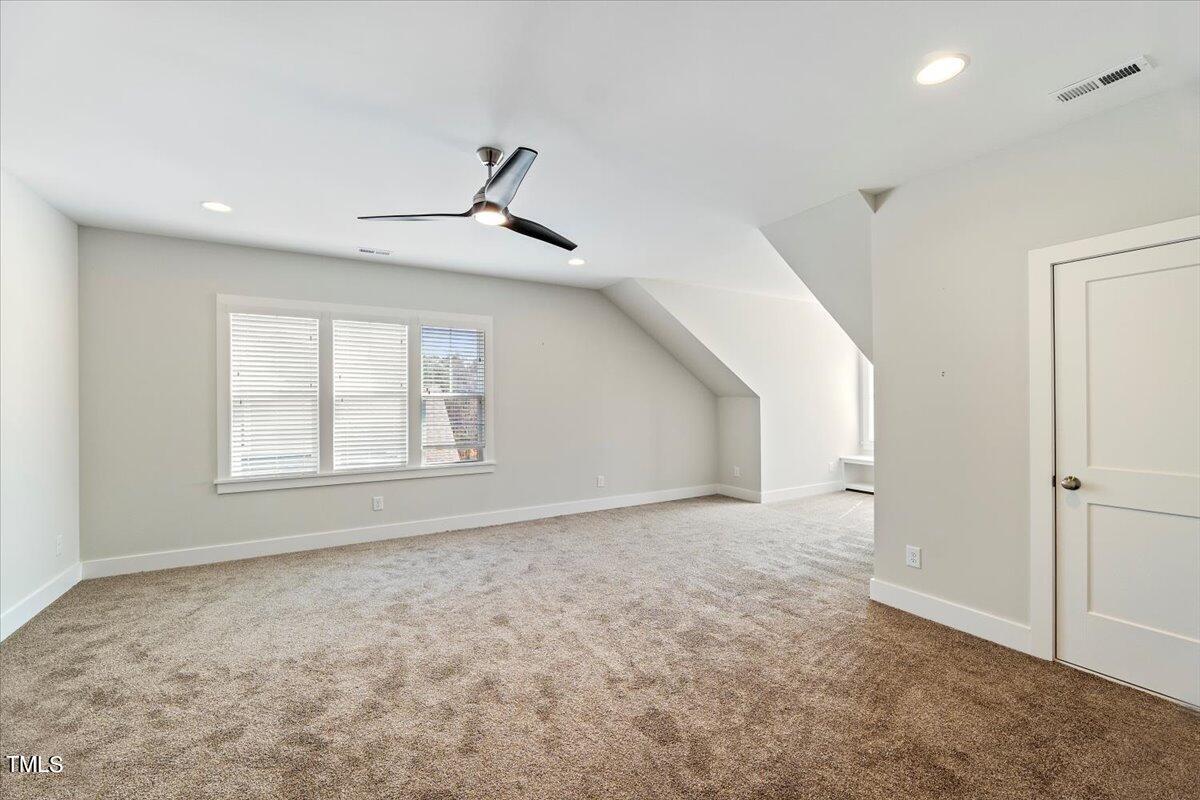 6152 Blanche Drive Raleigh, NC 27607 - Photo 34 of 47 a view of an empty room with a window