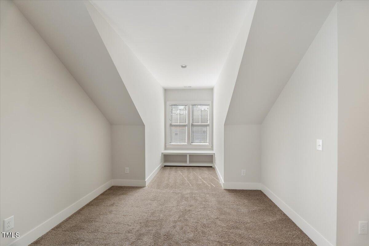 6152 Blanche Drive Raleigh, NC 27607 - Photo 35 of 47 a view of an empty room with a window