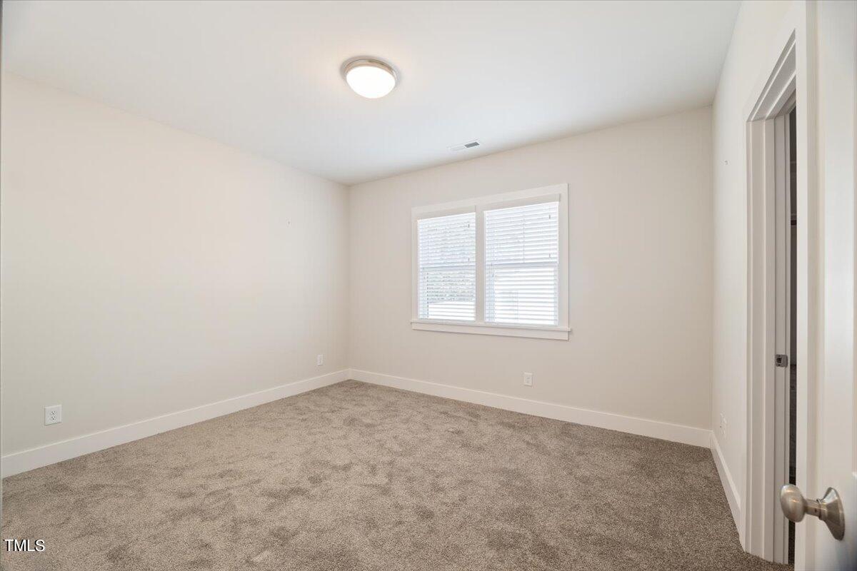 6152 Blanche Drive Raleigh, NC 27607 - Photo 37 of 47 an empty room with a window