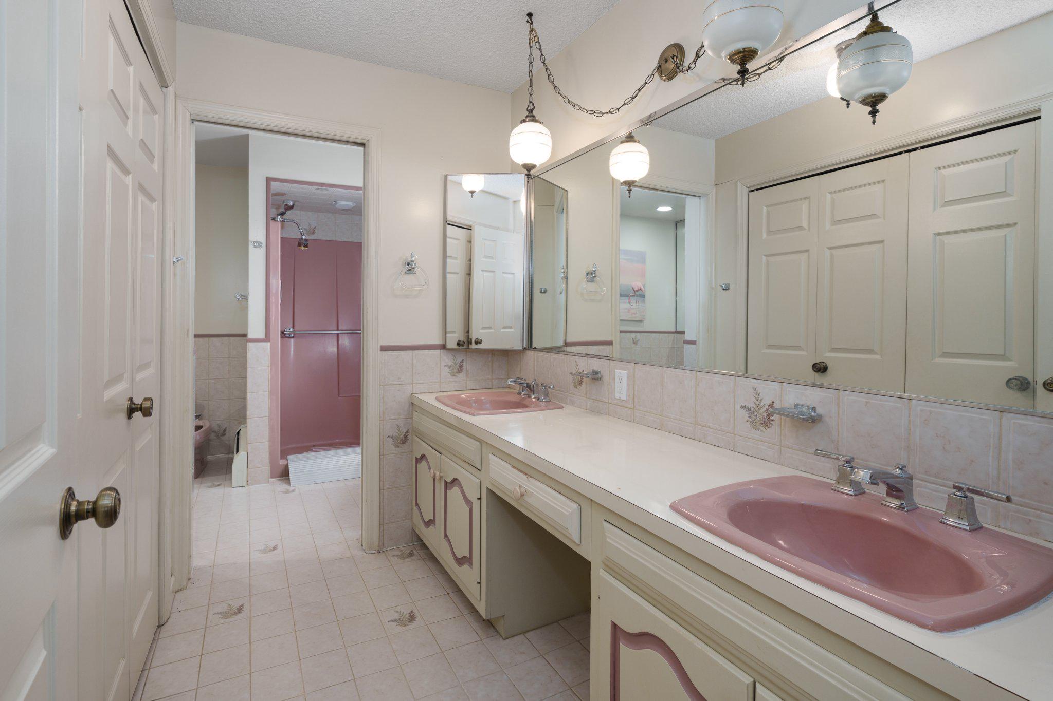 338 Gallup Road Princeton, NJ 08540 - Photo 33 of 53 a bathroom with a sink double vanity granite tub shower and a mirror
