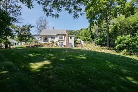 a view of a house with a big yard
