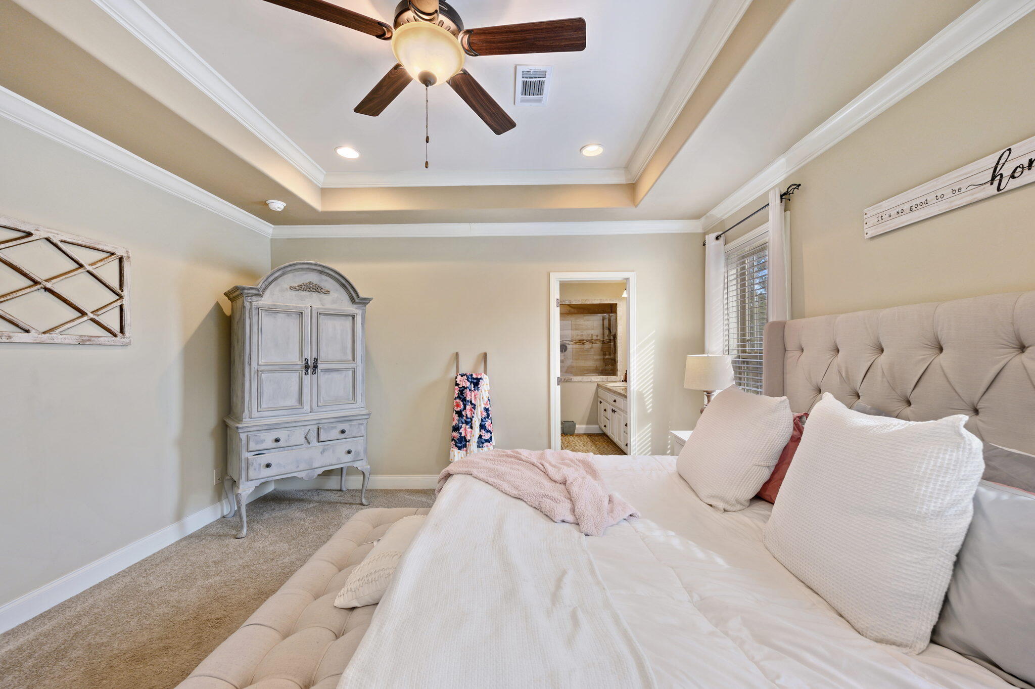6019 Old River Road Baker, FL 32531 - Photo 19 of 54 a bed room with a bed and a chandelier