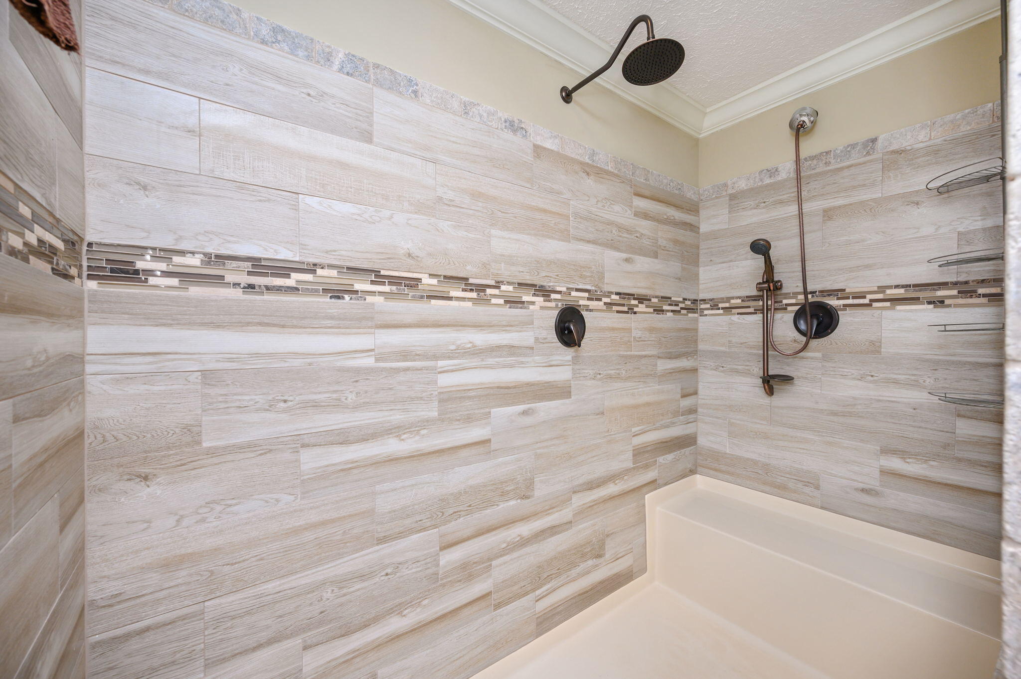 6019 Old River Road Baker, FL 32531 - Photo 22 of 54 a bathroom with a bathtub and a shower