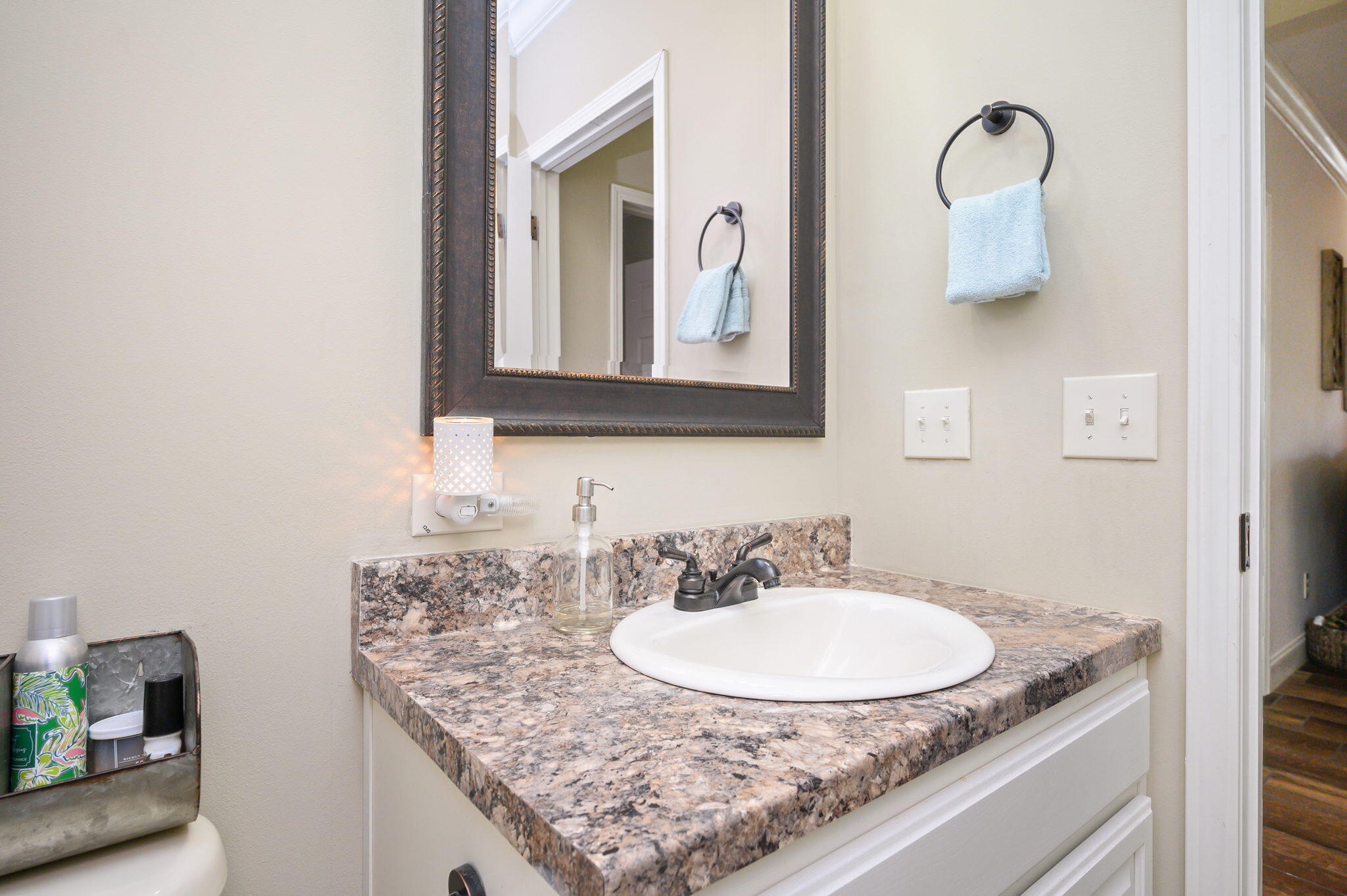 6019 Old River Road Baker, FL 32531 - Photo 36 of 54 a bathroom with a granite countertop sink and a mirror