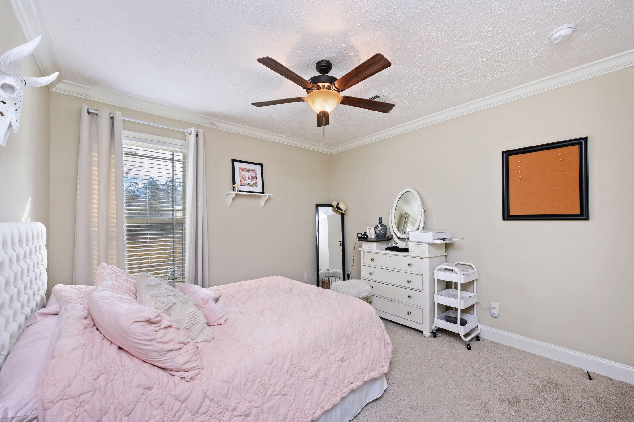 6019 Old River Road Baker, FL 32531 - Photo 37 of 54 a bedroom with a bed and a chandelier