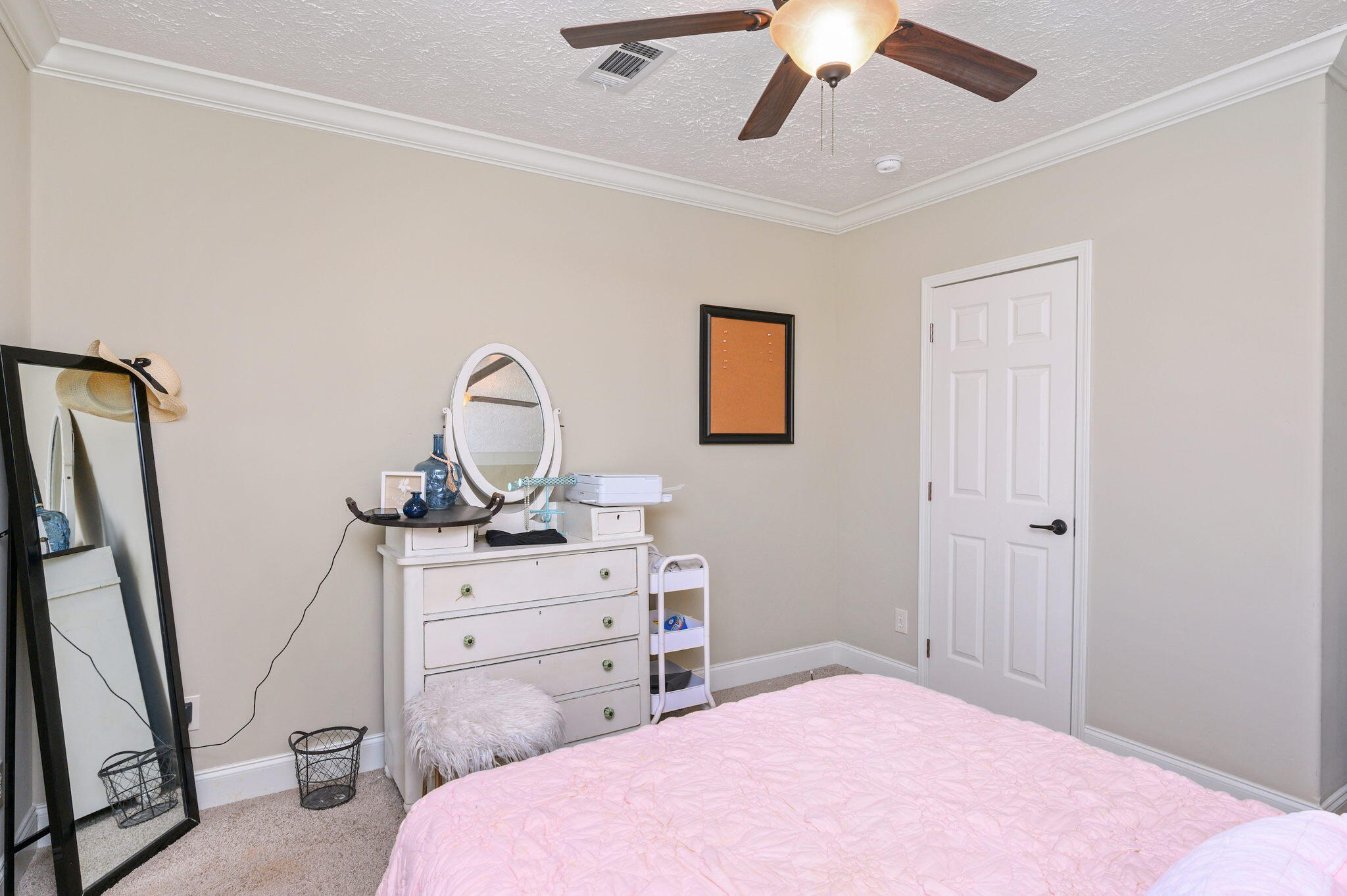 6019 Old River Road Baker, FL 32531 - Photo 38 of 54 a bedroom with a bed and a dresser