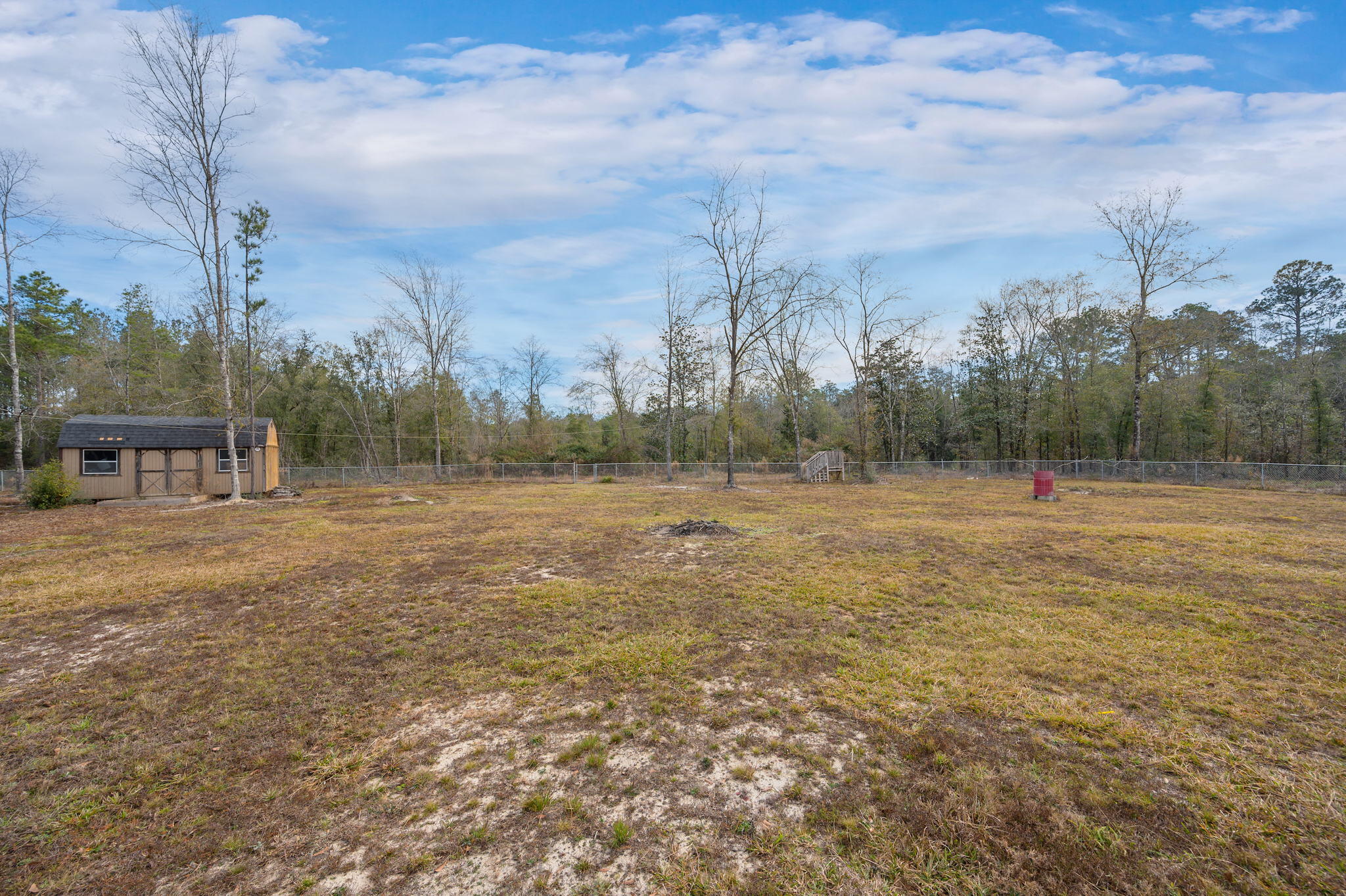 6019 Old River Road Baker, FL 32531 - Photo 47 of 54 a view of a field with trees