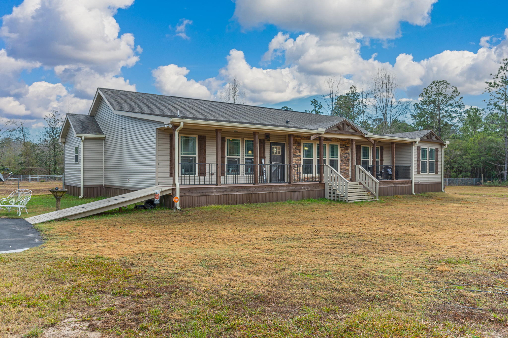 6019 Old River Road Baker, FL 32531 - Photo 6 of 54 a view of a house with a yard balcony and swimming pool