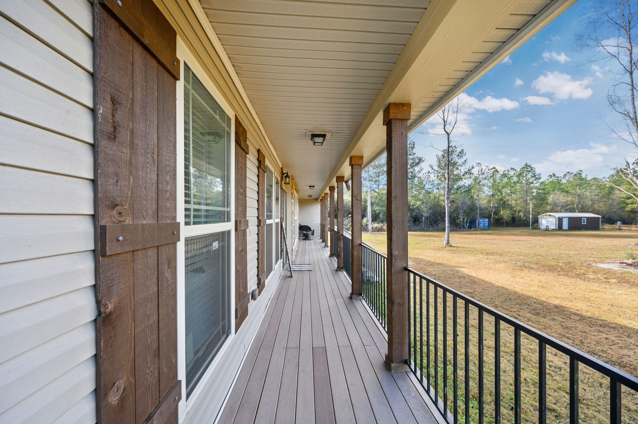 6019 Old River Road Baker, FL 32531 - Photo 7 of 54 a view of a balcony