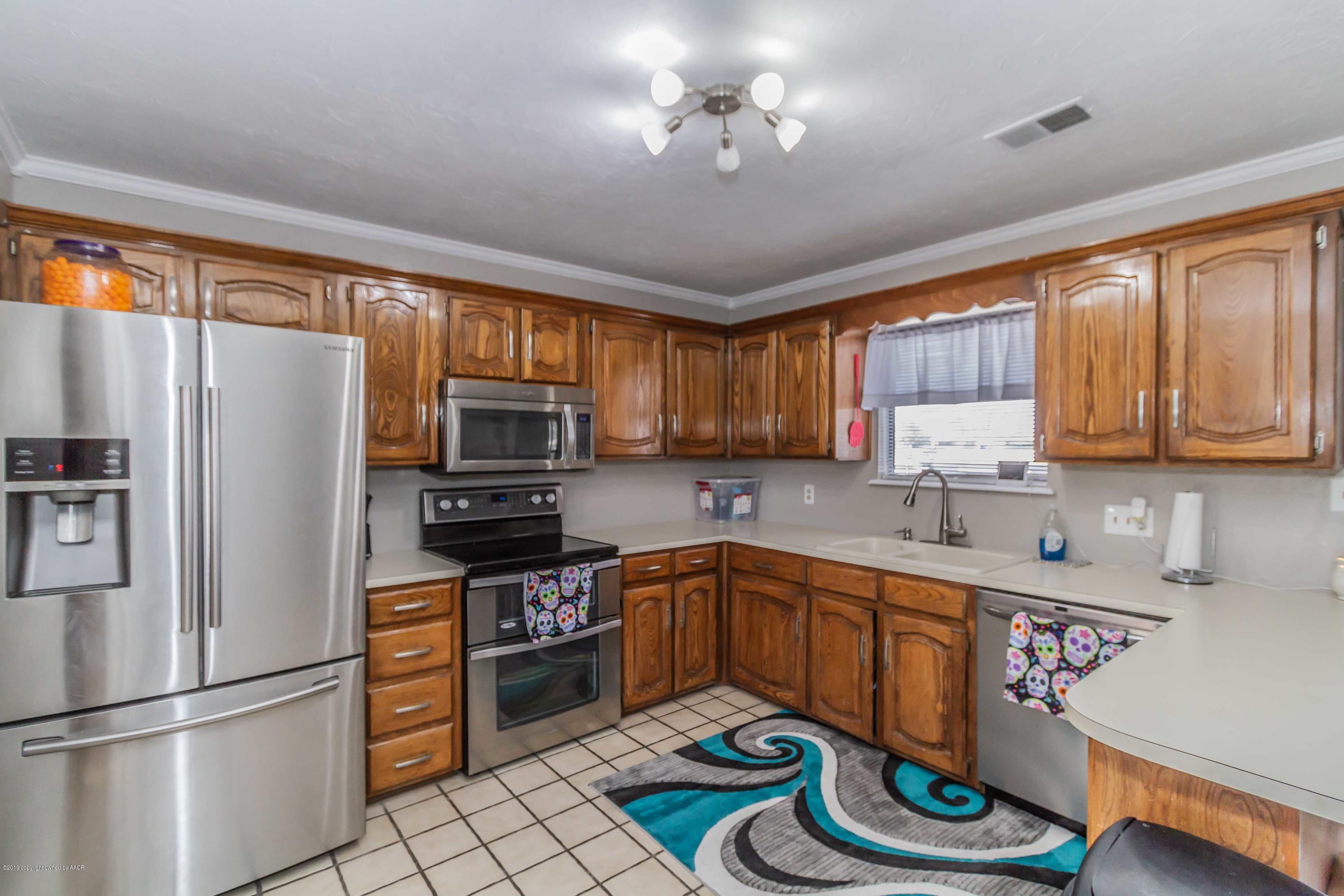 303 Caddo Road Amarillo, TX 79108 - Photo 11 of 44 KITCHEN VIEW 2