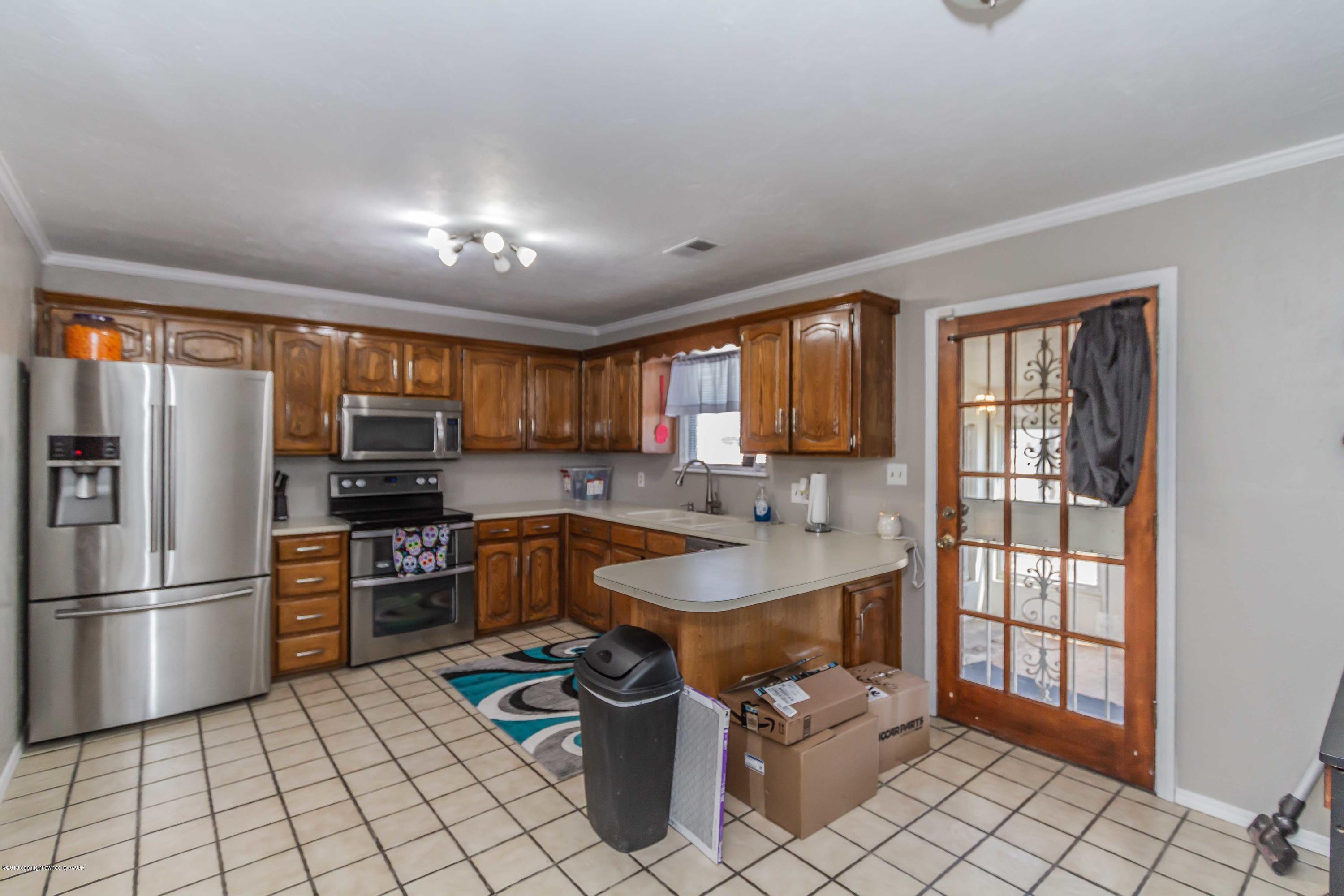 303 Caddo Road Amarillo, TX 79108 - Photo 10 of 44 KITCHEN VIEW 1