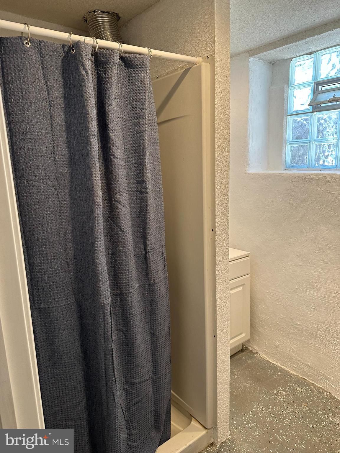 3 Harvin Road Upper Darby, PA 19082 - Photo 15 of 17 a bathroom with a shower and a sink