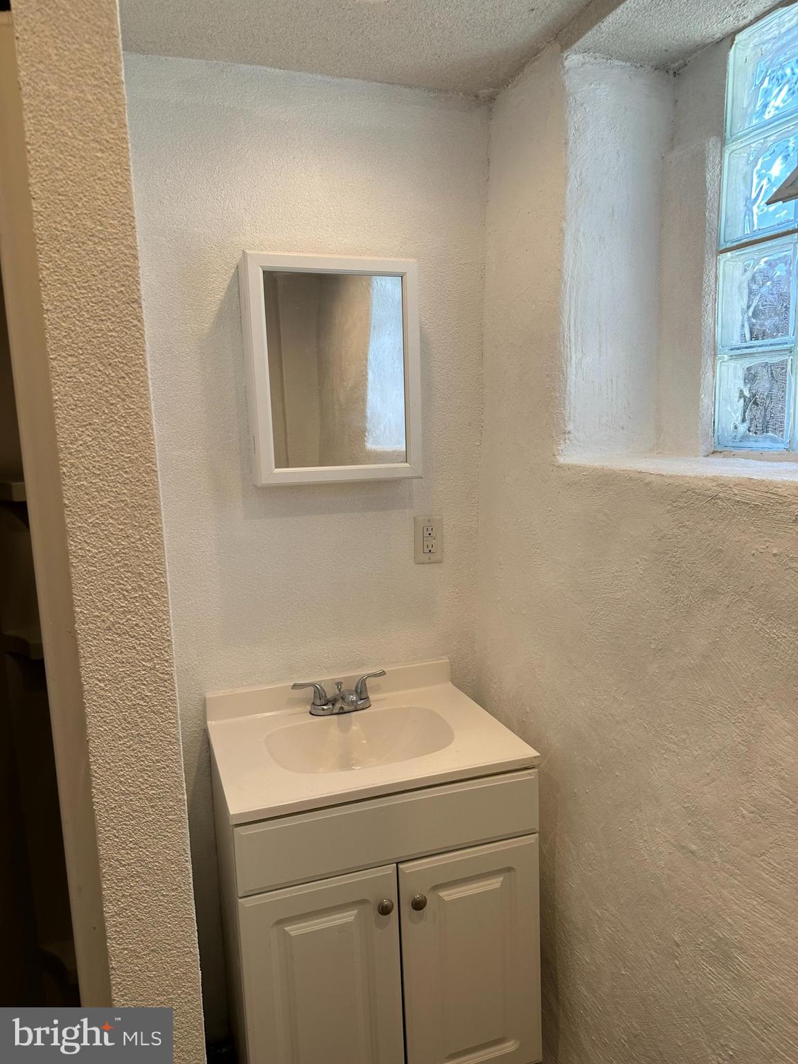 3 Harvin Road Upper Darby, PA 19082 - Photo 17 of 17 a bathroom with a sink and a vanity