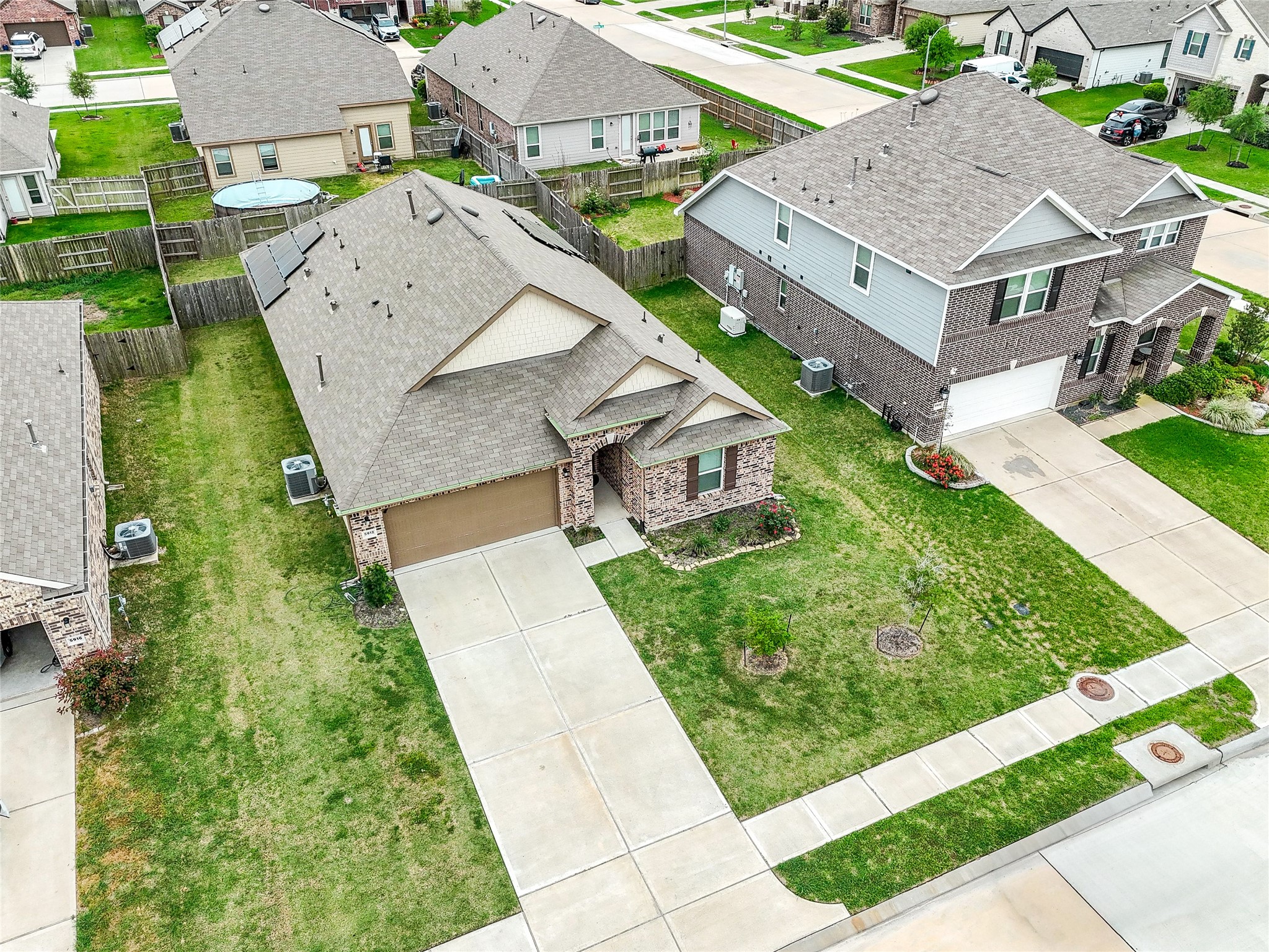 5912 Whitewing Road Rosenberg, TX 77469 - Photo 2 of 25 an aerial view of a house with a garden