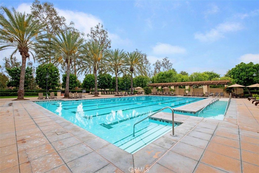 104 Costero Aisle, Unit 290 Irvine, CA 92614 - Photo 13 of 14 a view of an outdoor space and swimming pool