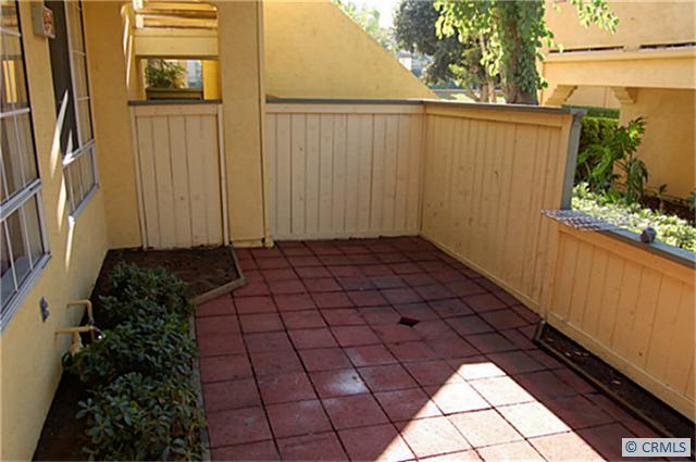 104 Costero Aisle, Unit 290 Irvine, CA 92614 - Photo 3 of 14 a view of a backyard