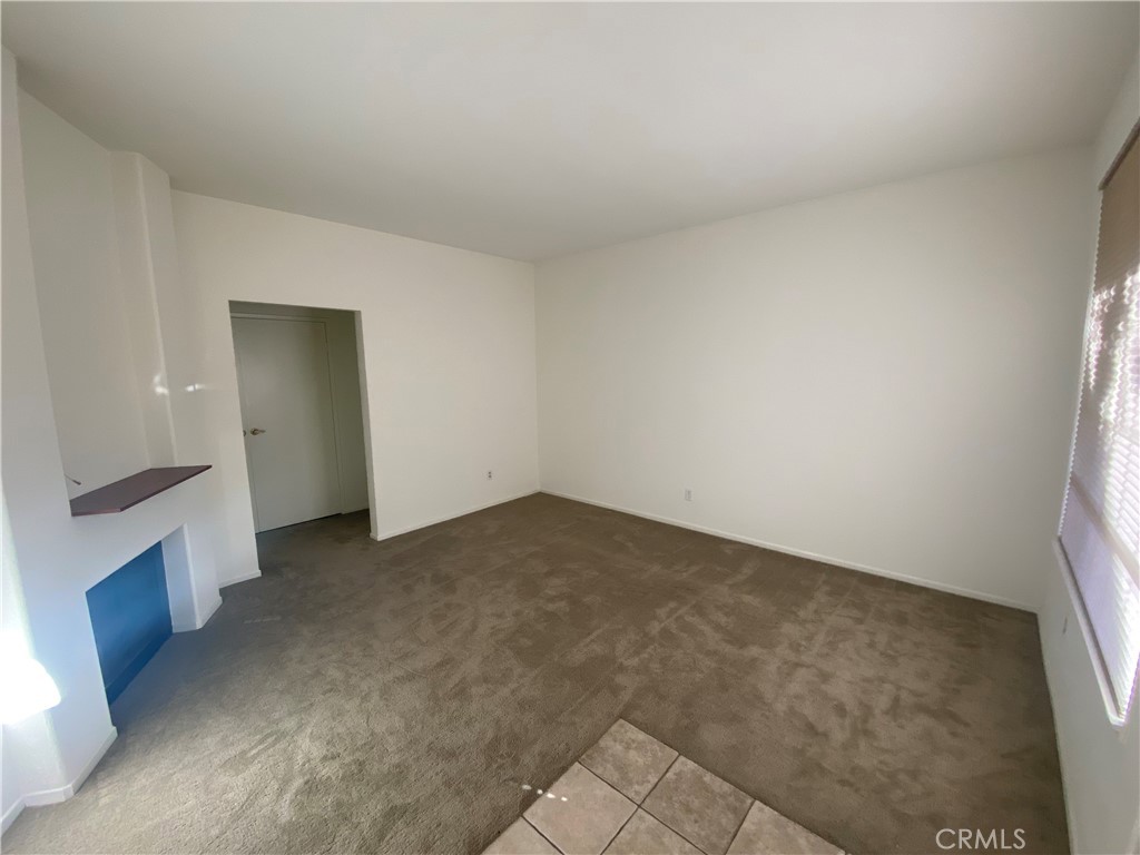 104 Costero Aisle, Unit 290 Irvine, CA 92614 - Photo 5 of 14 an empty room with windows