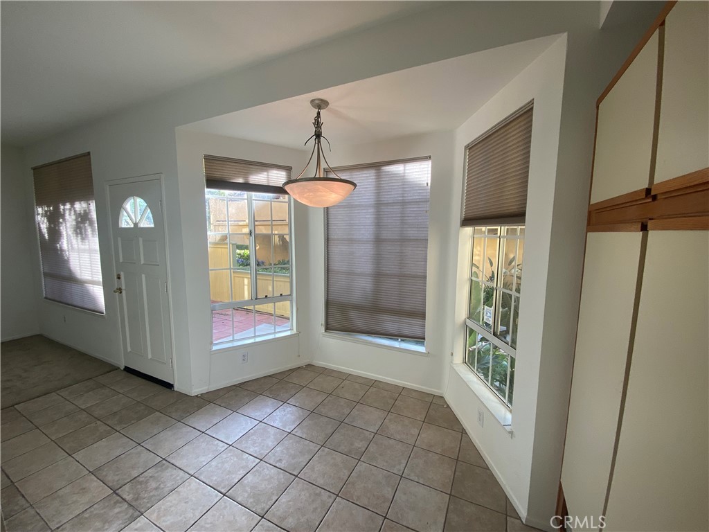 104 Costero Aisle, Unit 290 Irvine, CA 92614 - Photo 8 of 14 a view of entryway with front door
