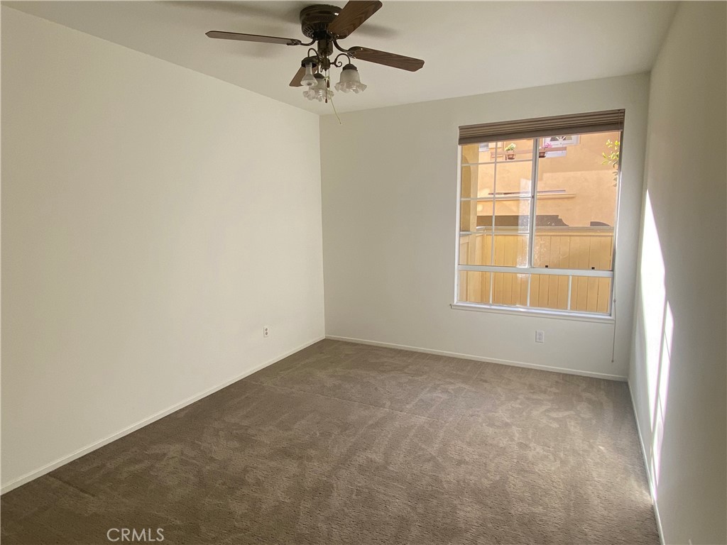 104 Costero Aisle, Unit 290 Irvine, CA 92614 - Photo 9 of 14 an empty room with a window