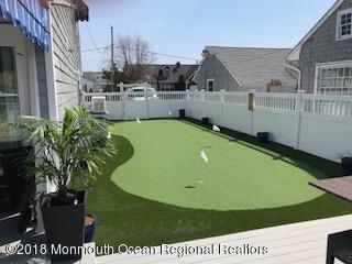 203 Helm Road Mantoloking, NJ 08738 - Photo 15 of 42 a view of a backyard