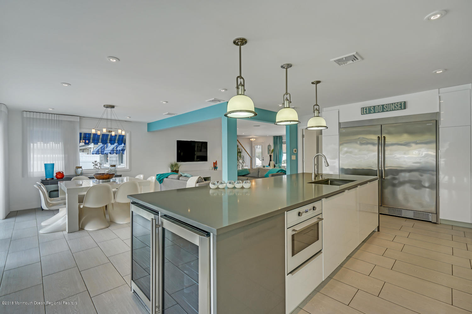 203 Helm Road Mantoloking, NJ 08738 - Photo 32 of 42 a kitchen with a stove a sink and a refrigerator