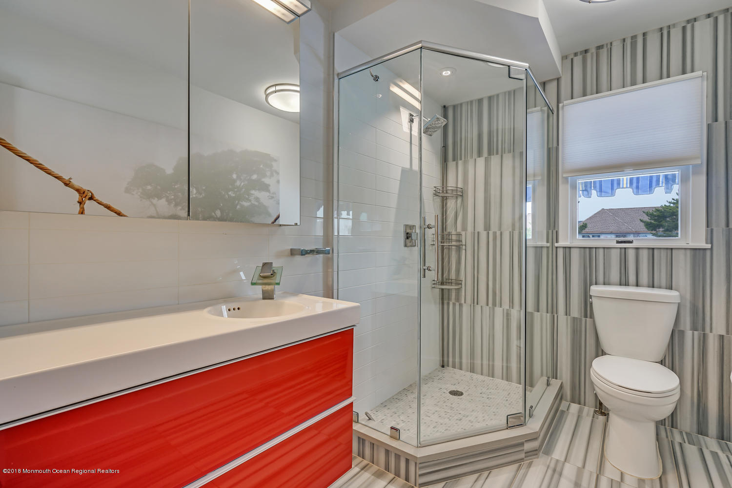 203 Helm Road Mantoloking, NJ 08738 - Photo 34 of 42 a bathroom with a sink a toilet and shower