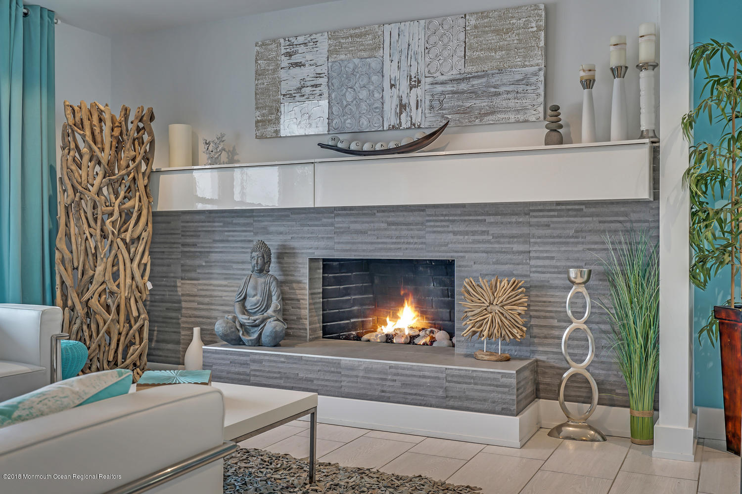 203 Helm Road Mantoloking, NJ 08738 - Photo 4 of 42 a living room with furniture and a fireplace