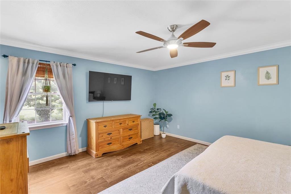 152 Cupps Road Renfrew, PA 16053 - Photo 28 of 43 a bedroom with a bed and a flat screen tv