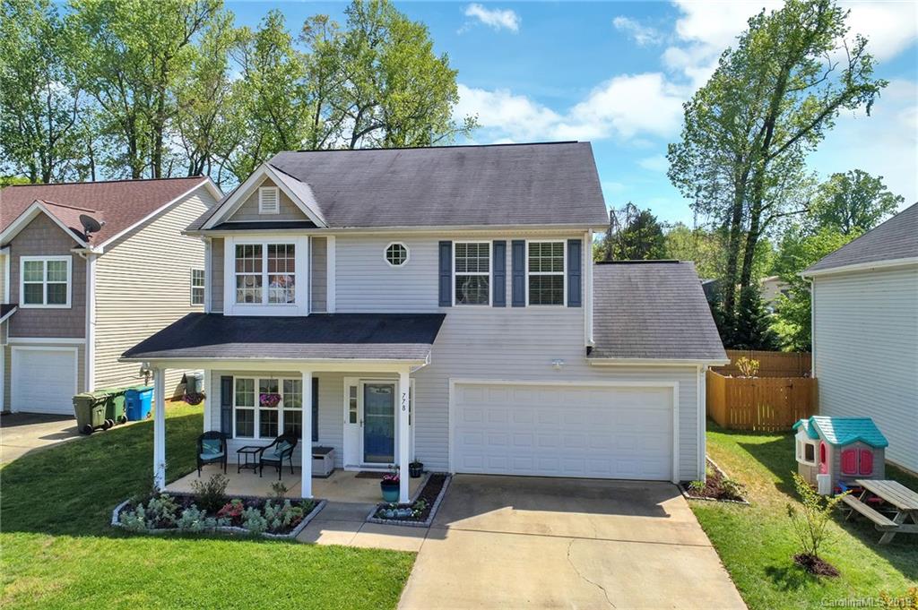 778 Jones Branch Road Fort Mill, SC 29715 - Photo 2 of 44 a front view of a house with garden