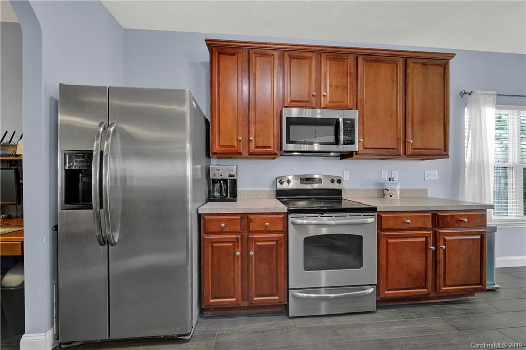 778 Jones Branch Road Fort Mill, SC 29715 - Photo 11 of 44 a kitchen with a stove microwave and refrigerator