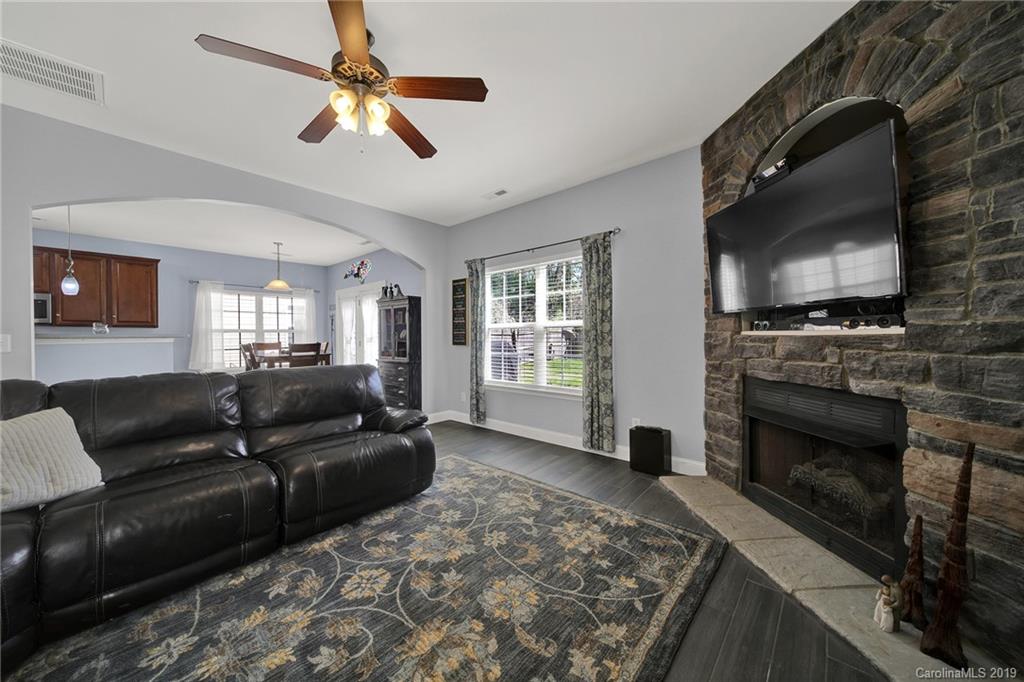 778 Jones Branch Road Fort Mill, SC 29715 - Photo 16 of 44 a living room with furniture and a flat screen tv