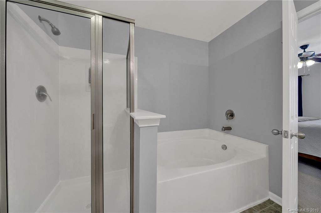 778 Jones Branch Road Fort Mill, SC 29715 - Photo 24 of 44 a bathroom with a bathtub and a shower