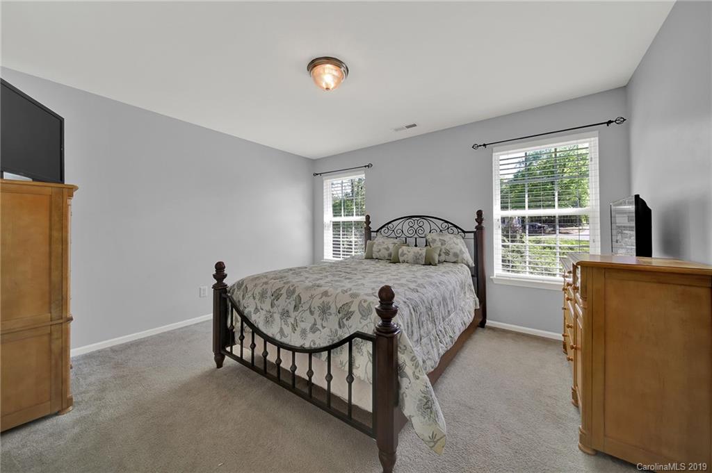 778 Jones Branch Road Fort Mill, SC 29715 - Photo 29 of 44 a bedroom with a bed and a large window