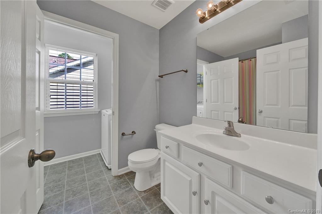 778 Jones Branch Road Fort Mill, SC 29715 - Photo 36 of 44 a bathroom with a sink a toilet and shower