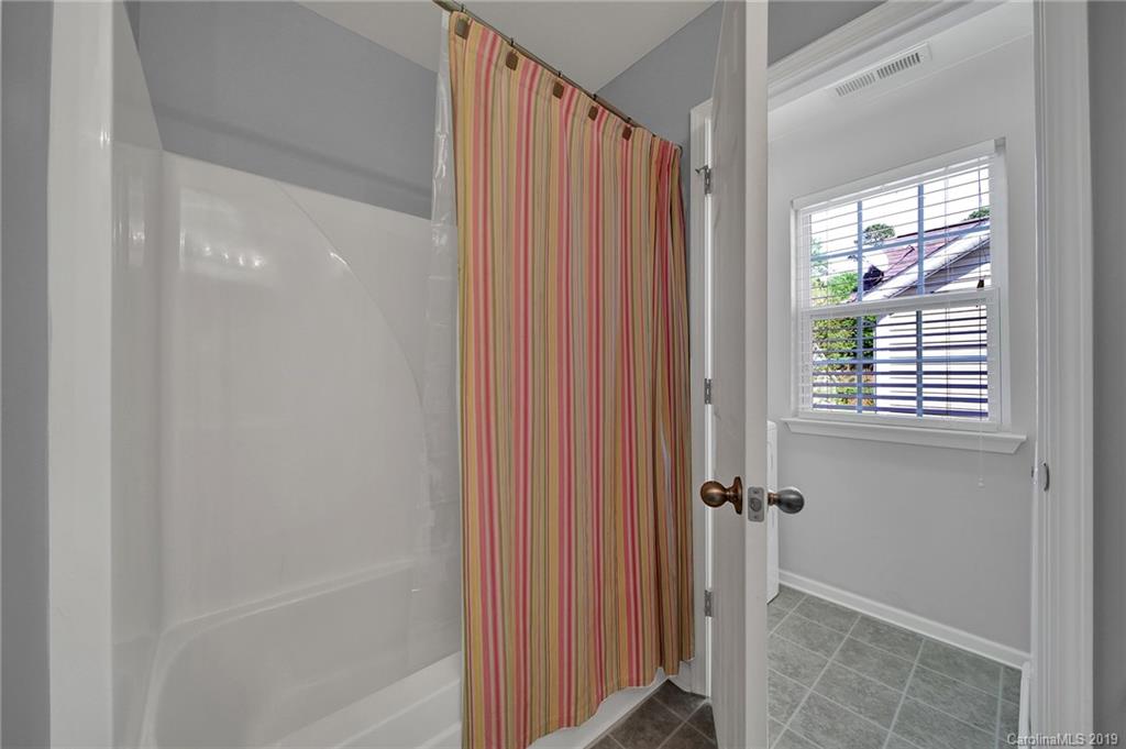 778 Jones Branch Road Fort Mill, SC 29715 - Photo 37 of 44 a bathroom with a shower and a sink