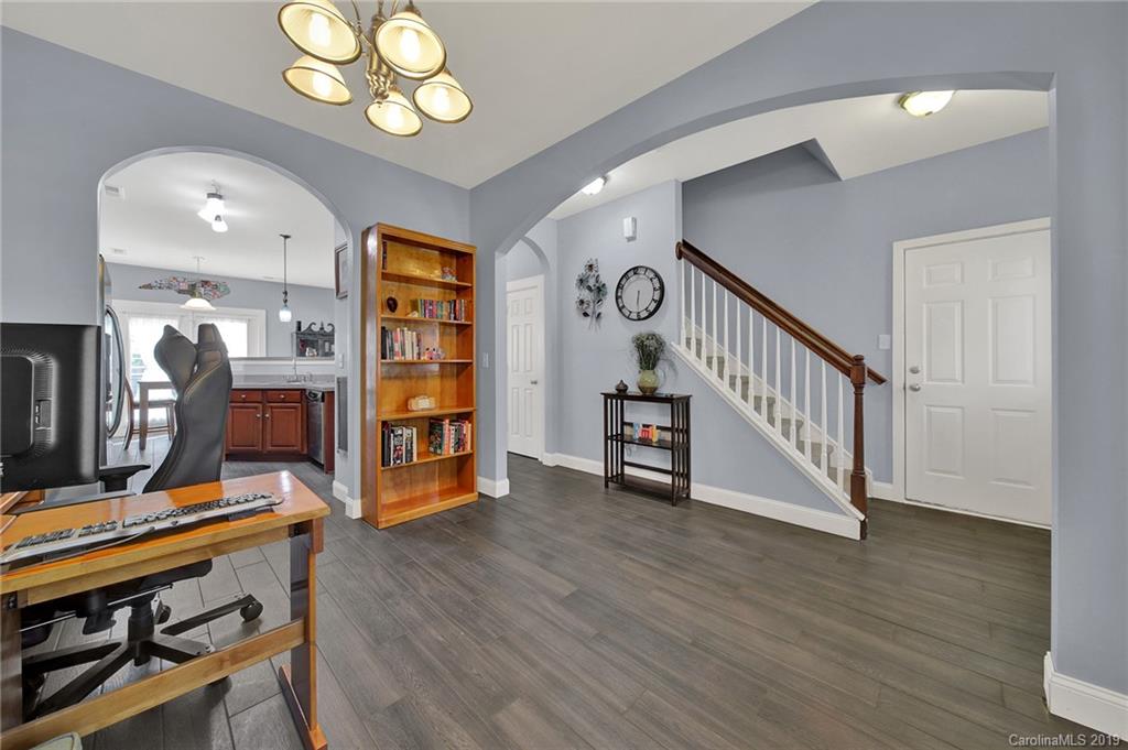 778 Jones Branch Road Fort Mill, SC 29715 - Photo 6 of 44 a view of a livingroom with furniture and wooden floor