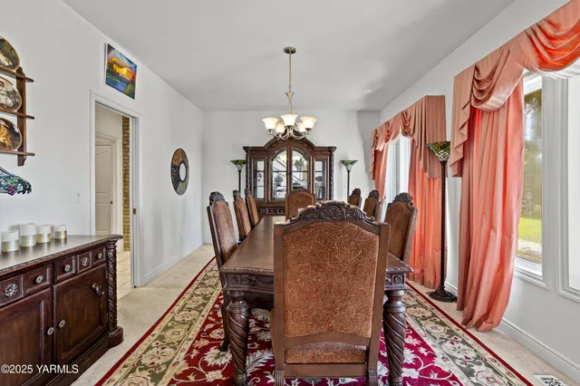 a view of a livingroom with furniture and fireplace