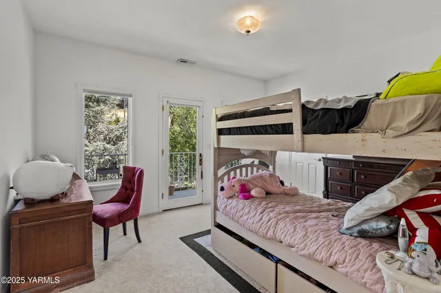 a view of a city with mountains in the background