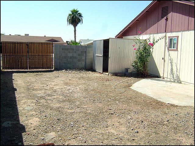 7138 West Hatcher Road Peoria, AZ 85345 - Photo 13 of 18 RV gate and spacious storage she