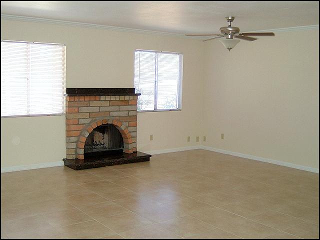 7138 West Hatcher Road Peoria, AZ 85345 - Photo 4 of 18 Warm and cozy fireplace
