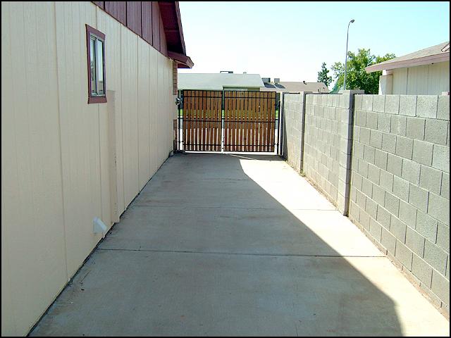 7138 West Hatcher Road Peoria, AZ 85345 - Photo 7 of 18 Side RV gate and entrance to backyard