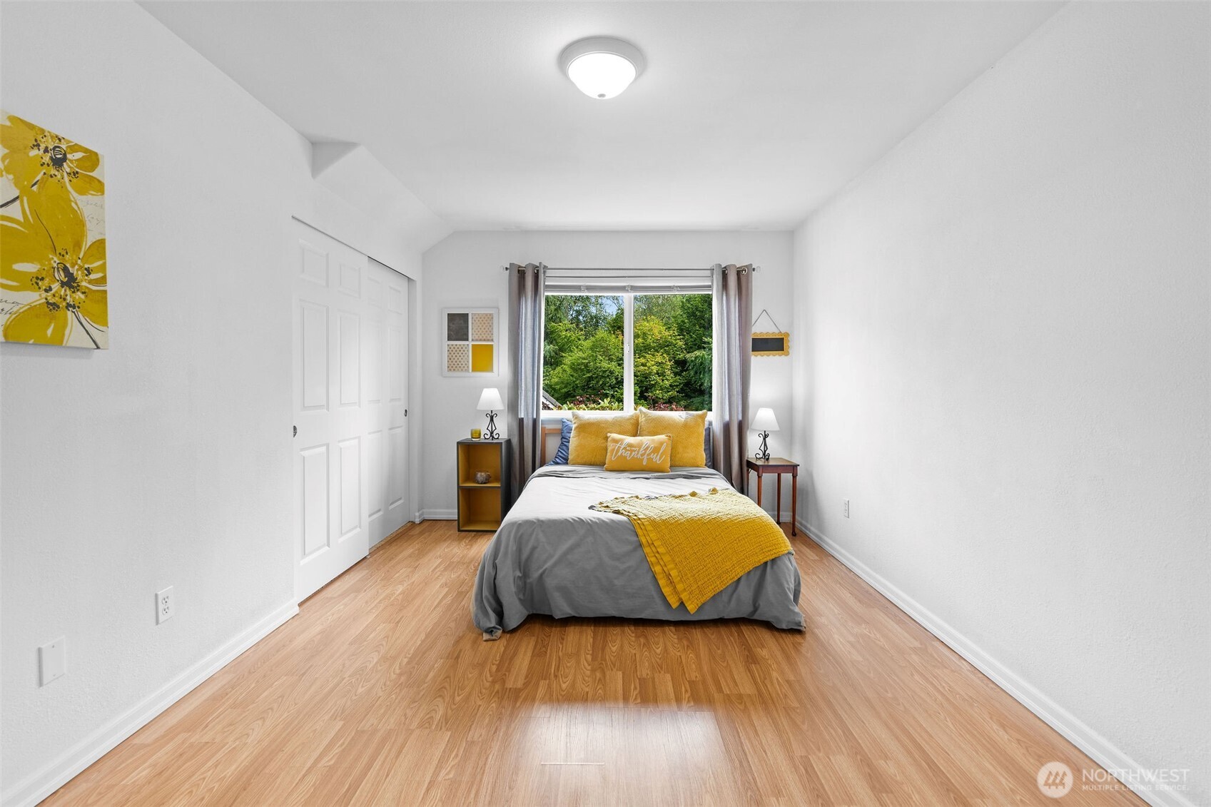 8425 Smugglers Cove Lane Mukilteo, WA 98275 - Photo 23 of 40 a bed room with a bed and window