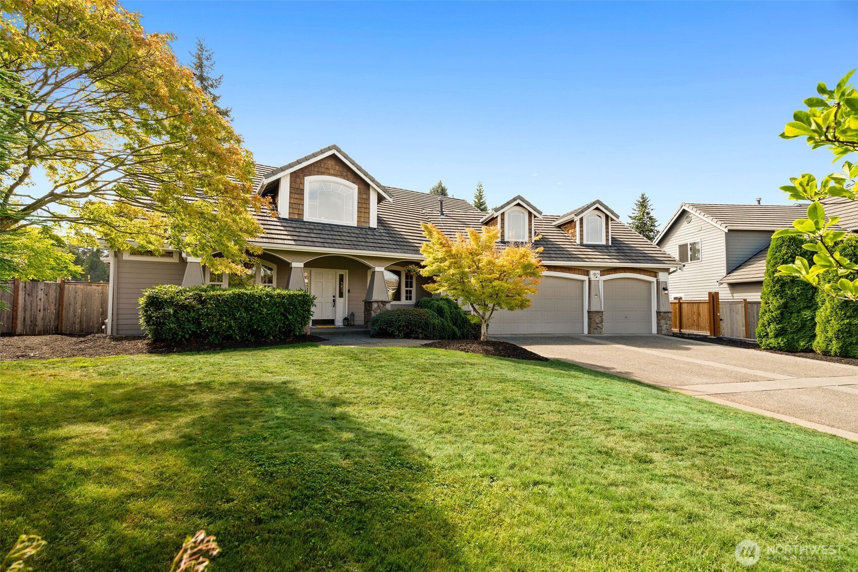 8425 Smugglers Cove Lane Mukilteo, WA 98275 - Photo 3 of 40 a house view with a garden space