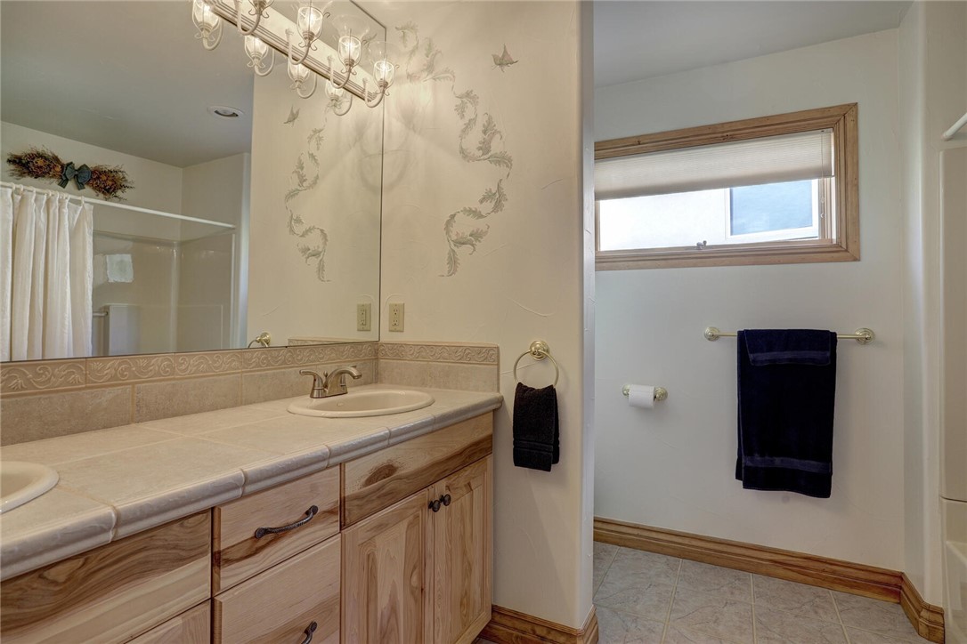 137 Rasor Drive Keystone, CO 80435 - Photo 13 of 35 a bathroom with a sink and a mirror