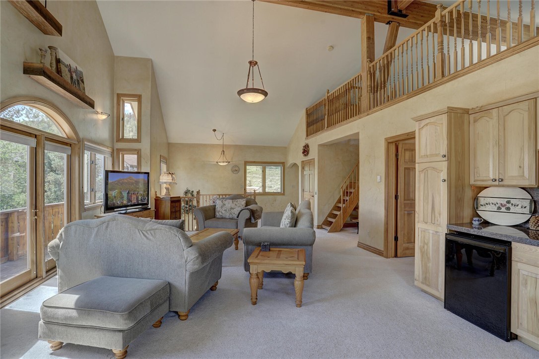 137 Rasor Drive Keystone, CO 80435 - Photo 20 of 35 a living room with furniture and a fireplace