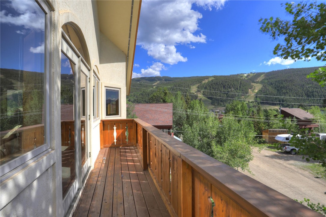 137 Rasor Drive Keystone, CO 80435 - Photo 2 of 35 a view of balcony with wooden floor and a bench