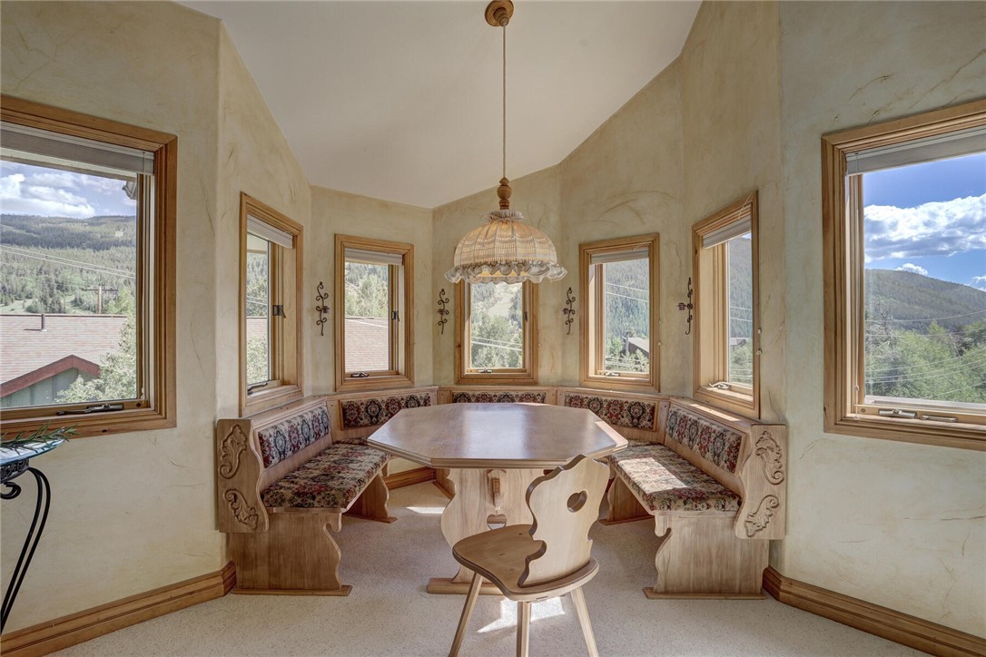 137 Rasor Drive Keystone, CO 80435 - Photo 21 of 35 a dining room with furniture and window
