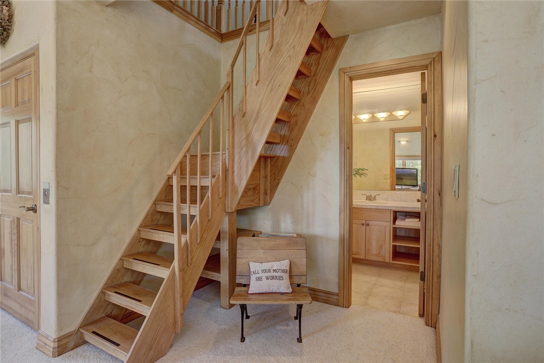 137 Rasor Drive Keystone, CO 80435 - Photo 27 of 35 a view of hallway with stairs and wooden floor