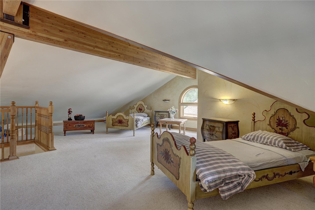 137 Rasor Drive Keystone, CO 80435 - Photo 28 of 35 a bedroom with furniture and a large window